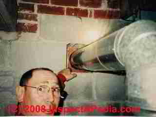 Leaky flue vent connector at chimney (C) Daniel Friedman
