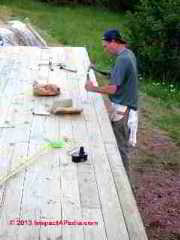 Setting nails in 2x6 decking at the SummerBlue Arts Camp, Two Harbors MN (C) Daniel Friedman
