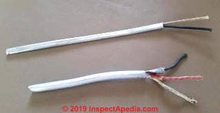 Old electrical wiring, plastic sheathed, two conductor (C) Inspectapedia.com Sean