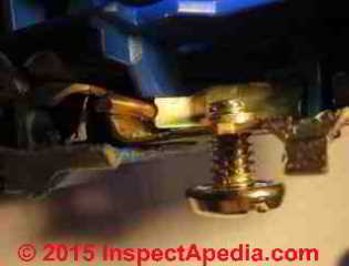 Binding head screw connector on an electrical receptacle (C) Daniel Friedman