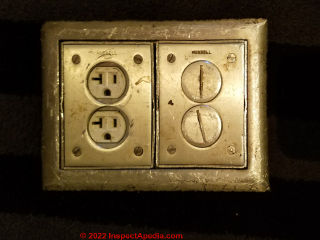 New York city floor mounted electrical receptacle "outlet" - (C) Daniel Friedman at Inspectapedia.com