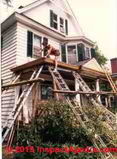 Repairing the roof and eaves trough gutters 57 S. Grand Ave. Poughkeepsie NY (C) Daniel Friedman