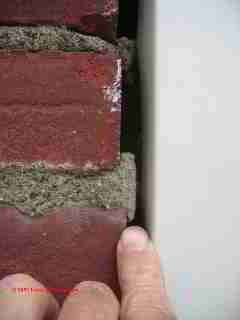 Very loose brick veneer wall © Daniel Friedman at InspectApedia.com