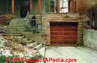 Basement-Garage with in-slope driveway invites basement flooding (C) InspectAPedia Carson Dunlop Associates