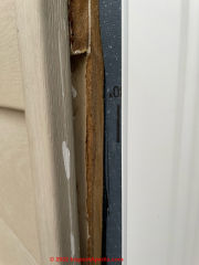 End cut view of siding helps identify the material as plant-fibre or wood based hardboard (C) InspectApedia.com Ott