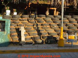 Retaining wall built of used automobile or truck tires (C) Daniel Friedman