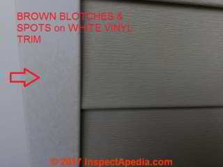 Vinyl siding spotty stains appeared after cleaning (C) InspectApedia.com BD