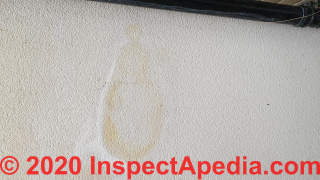 Tan teardrop shaped stain on wall (C) InspectApedia.com Zoe