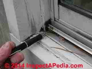 Window exterior rot where no storm was installed (C) Daniel Friedman