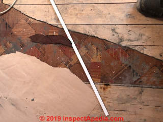 1950s lino in a UK Council House - may contain asbestos (C) Inspectapedia.com DDMG