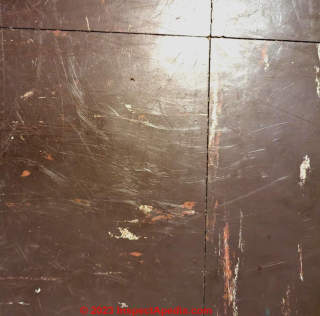 1970s UK brown floor tile (C) InspectApedia.com Charlene