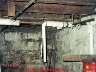 Asbestos pipe insulation falling off of copper piping in NY (C) Daniel Friedman