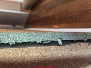 Possible asbestos in cork surfaced wall tiles (C) InspectApedia.com LauraG
