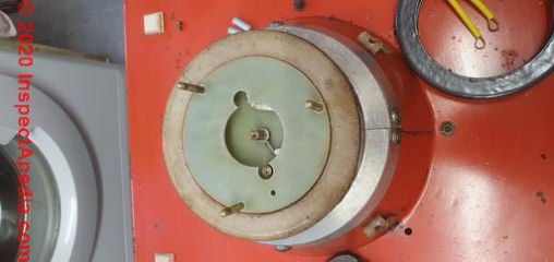 Asbestos gasket in candy floss (cotton candy) machine (C) InspectApedia.com Twiz