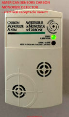 American Sensors brand CO detector mounts in electrical receptacle (C) InspectApedia.com Daisy