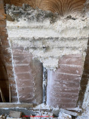 Asbestos insulation on building surface (C) InspectApedia.com Lapenna