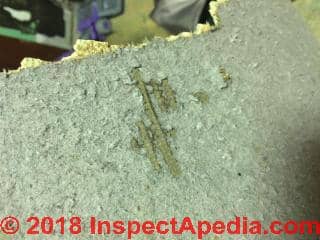 Unidentified flooring backer (C) InspectApedia.com Noel