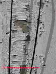 Photograph of old paint on a historic building, paint is likely to be a source of lead contamination on the soils below.