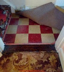 UK asbestos floor tile & older linoleum rug (C) Inspectapedia.com Rachel