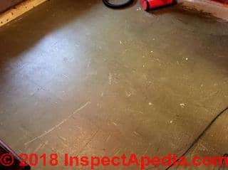Asbestos floor tile ESTIMATED as from 1970-1980 in Kent in the UK (C) InspectApedia.com  T.H. 