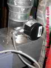 Photo of automatic flue vent damper (C) Daniel Friedman