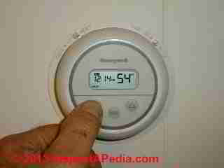 Old thermostat to be removed (C) Daniel Friedman