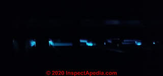 Weak blue LP gas flame on Armstrong furnace (C) InspectApedia.com PJ