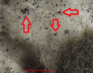 Slag wool insulation identified by blast furnace debris (C) Daniel Friedman at InspectApedia.com