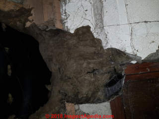 Fibre insulation, fiberglass or mineral wool, gray dirty? (C) InspectApedia.com Mark