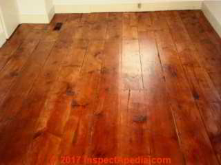 Antique widboard pine flooring, restored and stained (C) Daniel Friedman at InspectApedia.com