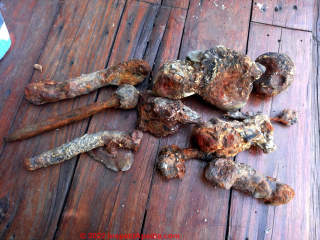 Cape Town South Africa nail remnants on beach and water (C) InspectApedia.com Brent