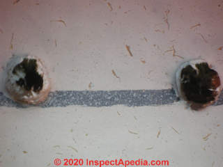 Acoustic ceiling tile from a 1962 Minnesota home - not asbestos (C) Daniel Friedman at InspectApedia.com