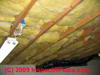 Fiberglass insulated basement ceiling (C) Daniel Friedman