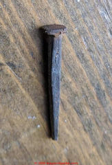 Early machine cut nail (C) InspectApedia.com J