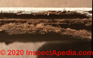 Fiberboard ceiling tiles - asbestos? (C) InspectApedia.com LeeJ