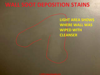 dark stains over large wal areas probably not thermal tracking (C) InspectApedia.com Kathleen