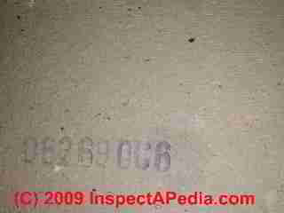 Printed identification number on drywall © Daniel Friedman at InspectApedia.com