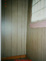 White wood paneling (poorly installed ) (C) Daniel Friedman at InspectApedia.com