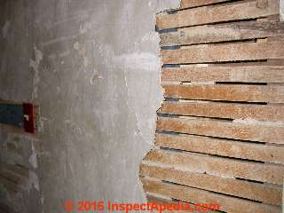 Sawn wooden lath and loose plaster (C) Daniel Friedman