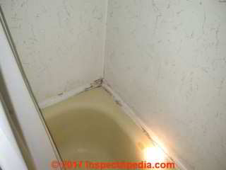 Laminated hardboard used  as a bathtub surround in an older U.S. home (C) Daniel Friedman