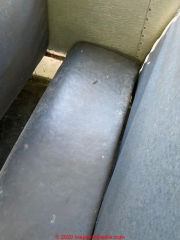 Extensive mold contamination on bus seat upholstery and possibly hidden mold in buses (C) InspectApedia.com Cindy