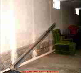 Photograph of severe mold and flood lines in a basement (C) Daniel Friedman