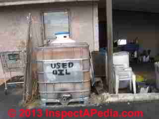 Used oil storage tanks at an automobile repair facility (C) Daniel Friedman