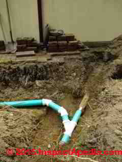 Sewer piping being installed in NY © D Friedman at InspectApedia.com 