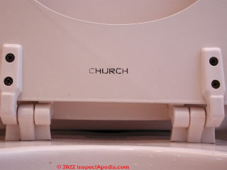 Church toilet seat (C) Daniel Friedman at InspectApedia.com
