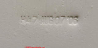 Crane toilet tank date stamp (C) Daniel Friedman, Inspectapedia.com