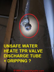 Unsafe Rheem electric water heater (C) InspectApedia.com Hogue T