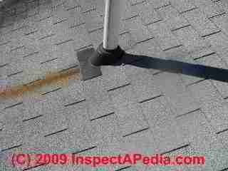 Photograph of reddish brown plumbing flashing rust stains on an asphalt shingle roof (C) Daniel Friedman