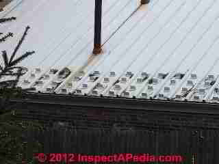 Snow guards on metal roof (C) Daniel Friedman
