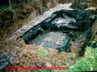 Impacted septic © D Friedman at InspectApedia.com 